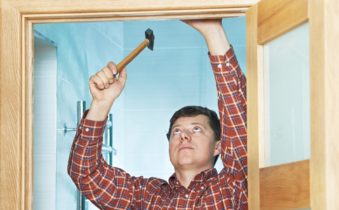 carpenter at door installation
